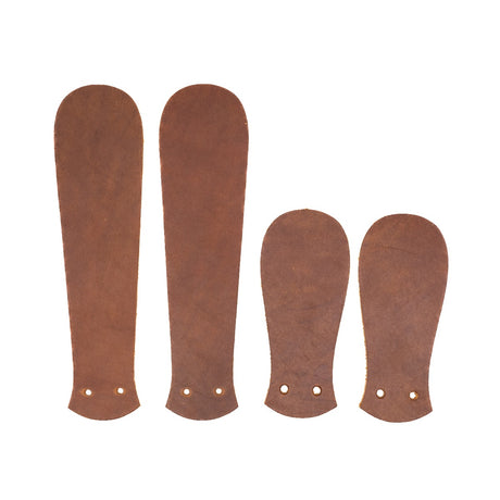 Predator Orange leather Casual Kilties on a white background.