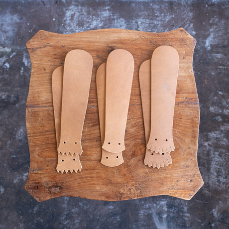 Tan Kiltie variety mix on a wooden table.