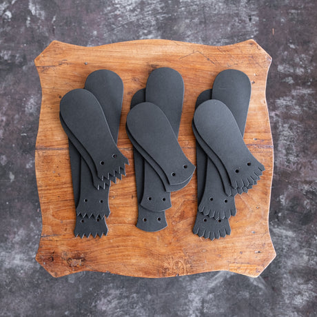 Black Kiltie variety mix on a wooden table.