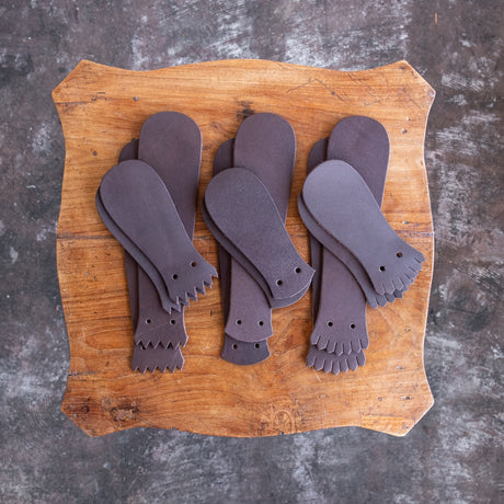 1964 Brown Kiltie variety mix on a wooden table.