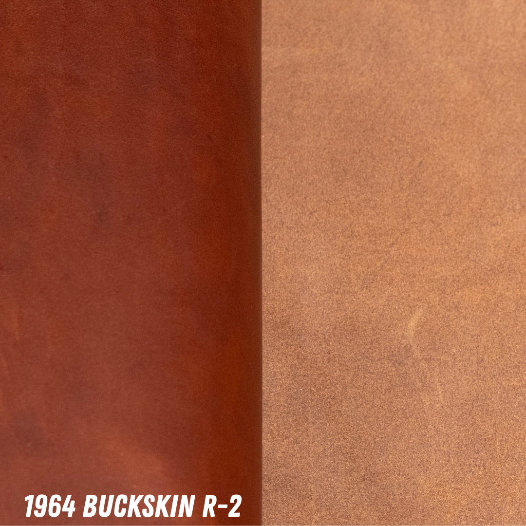 A close-up color and material swatch labeled '1964 BUCKSKIN R-2' showing smooth leather on the left and roughout on the right: a darker reddish-brown on the left and a lighter tan/caramel on the right.