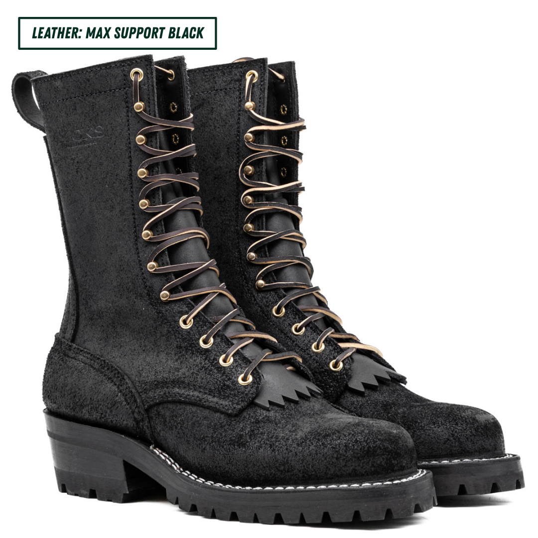 A pair of black leather lace-up boots with gold-tone eyelets and laces, shown on a white background with a text label in the top-left corner that reads 'LEATHER: MAX SUPPORT BLACK'.