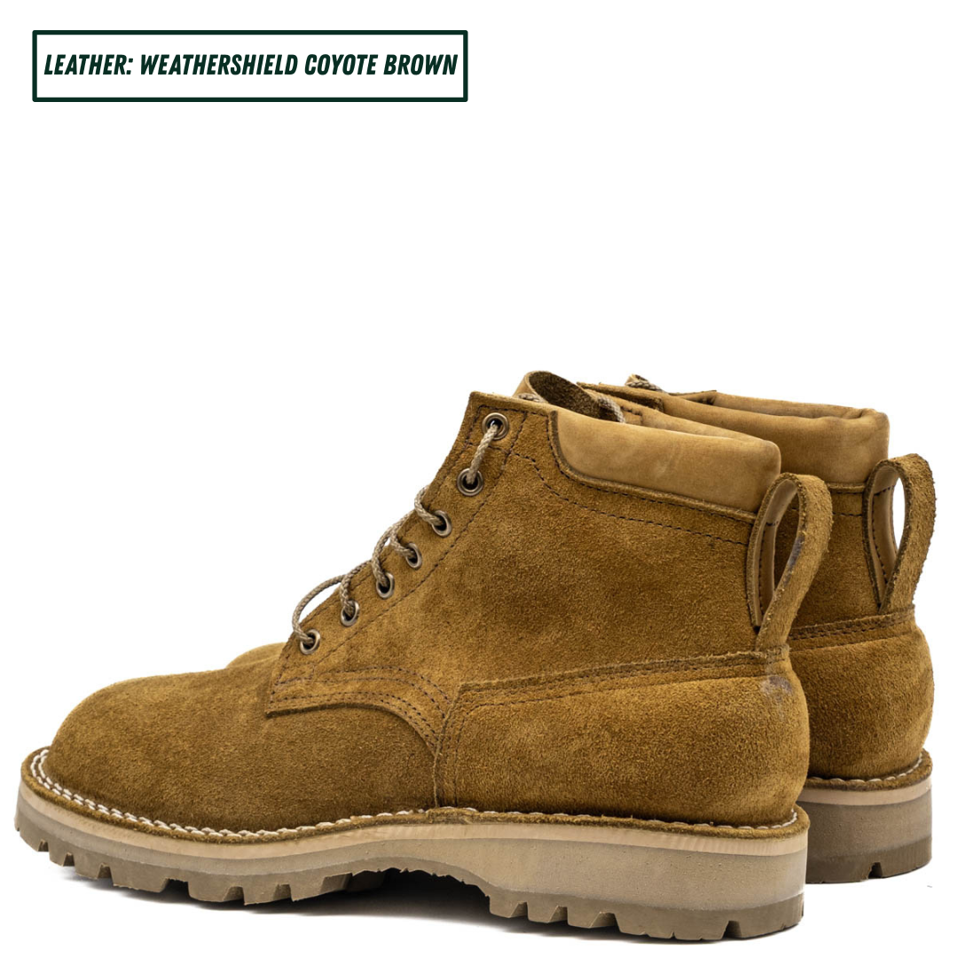 A pair of coyote brown suede lace-up ankle boots shown on a white background, with a text label in the top left reading 'LEATHER: WEATHERSHIELD COYOTE BROWN'.