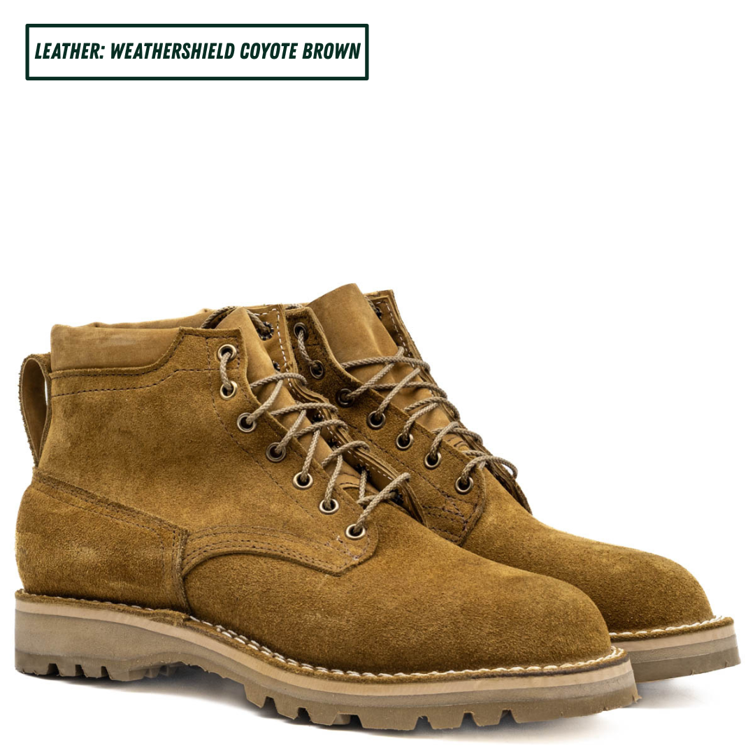 A pair of coyote brown suede lace-up boots with thick lug soles, shown on a white background with a text label at the top reading 'LEATHER: WEATHERSHIELD COYOTE BROWN'.