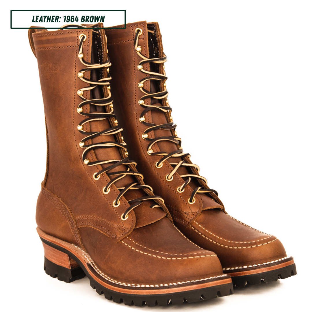 A pair of brown leather lace-up work boots with gold-toned metal eyelets and a chunky lug sole, shown on a white background with a text label in the top left corner.