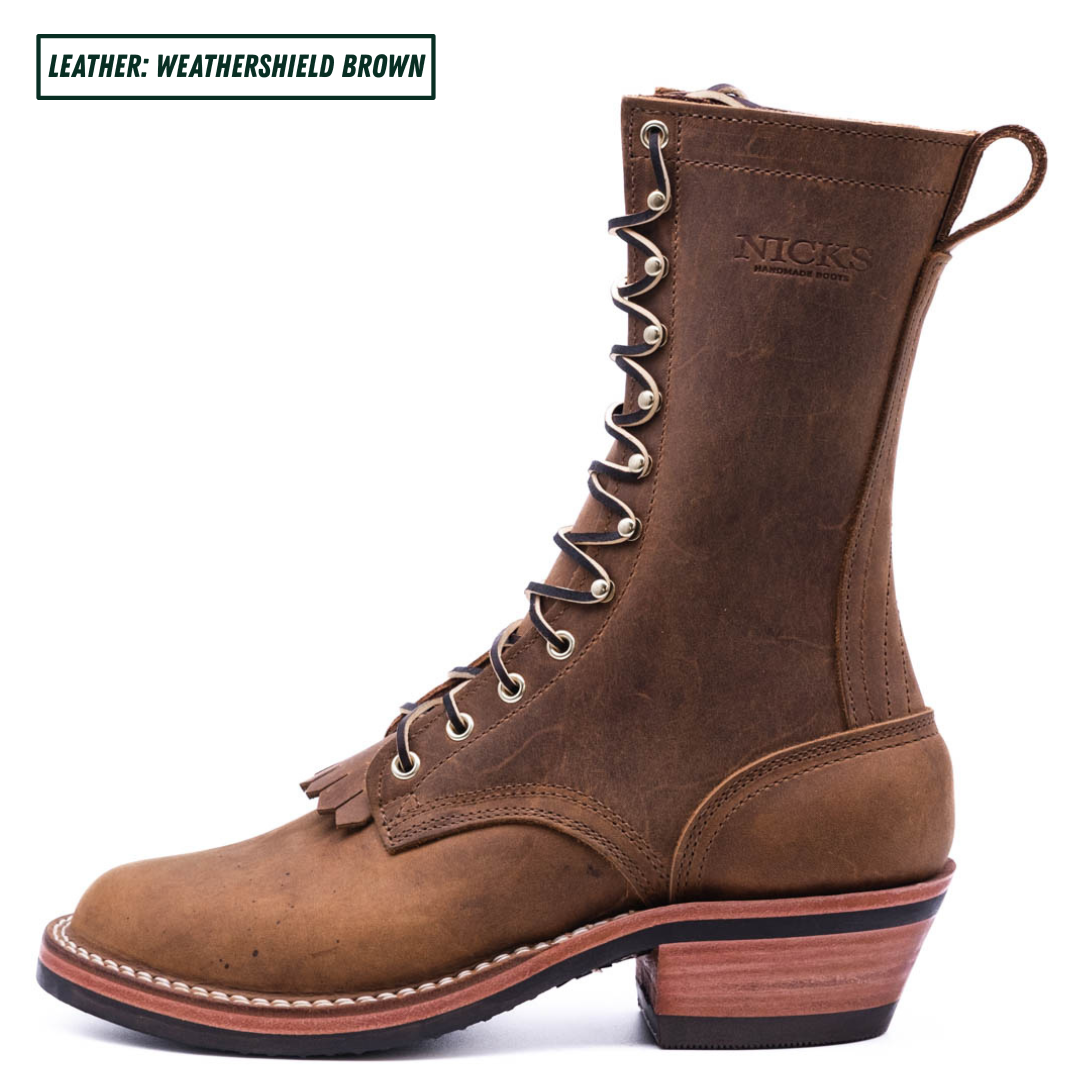 A brown leather lace-up boot shown in profile against a white background, with a small text label in the top-left corner reading 'LEATHER: WEATHERSHIELD BROWN'. The boot has metal eyelets, a pull loop at the top, and a stacked wooden-look heel.