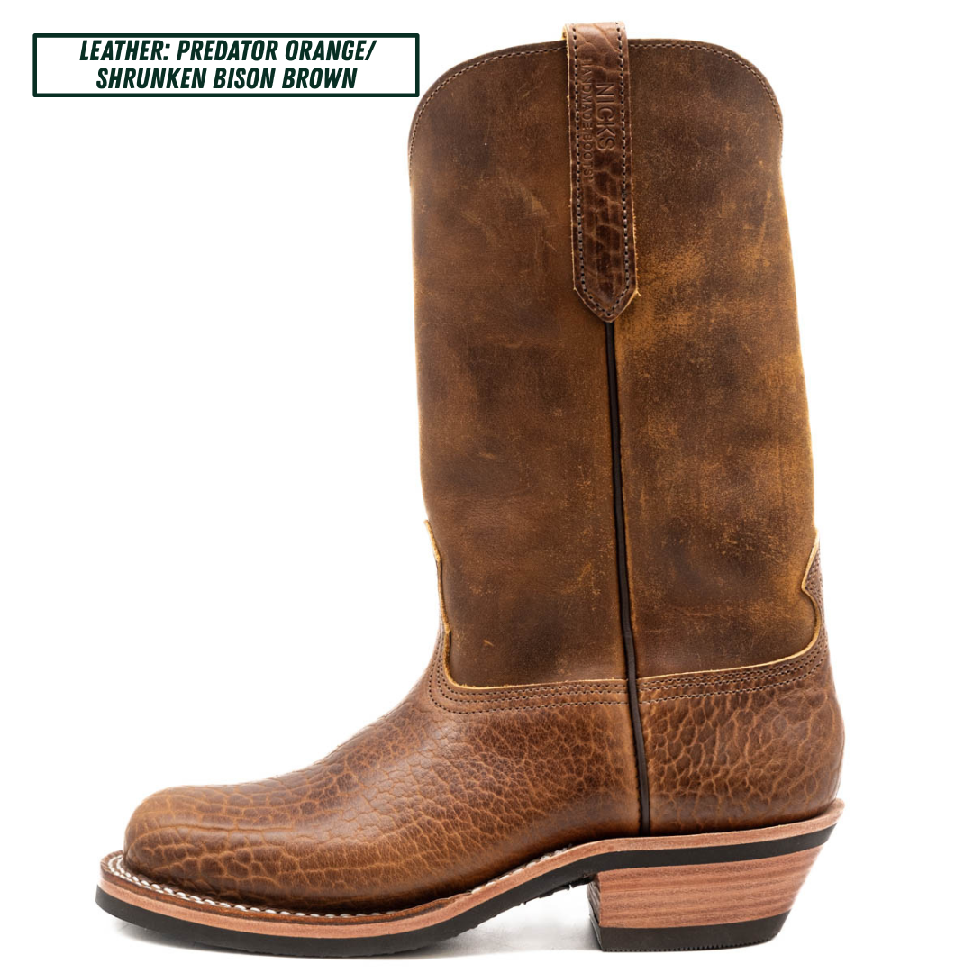 A single brown leather cowboy boot shown in profile against a white background, with a text label in the top-left corner reading 'LEATHER: PREDATOR ORANGE/ SHRUNKEN BISON BROWN'. The boot has a textured leather upper, a pull tab, and a stacked wood-look heel.