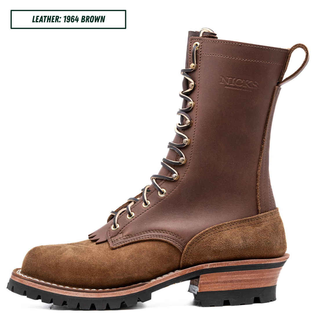 A brown leather lace-up work boot shown in profile on a white background, with a text label in the top-left corner reading 'LEATHER: 1964 BROWN'. The boot has a dark brown leather upper, a suede-like brown toe and heel panel, metal eyelets, and a black lug sole.