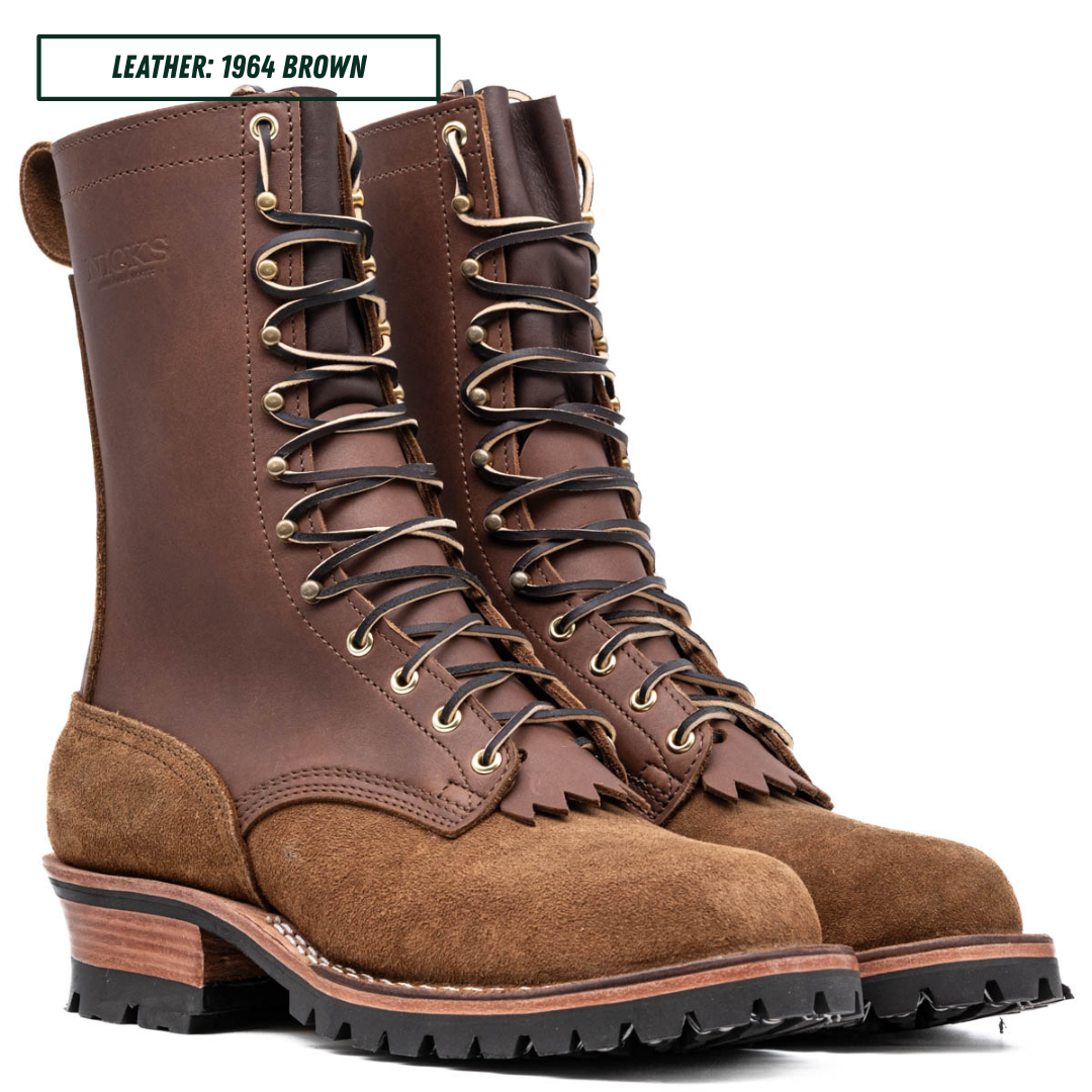 A pair of high-top lace-up boots in brown leather and suede, shown on a white background with a text label in the top left corner that reads 'LEATHER: 1964 BROWN'.