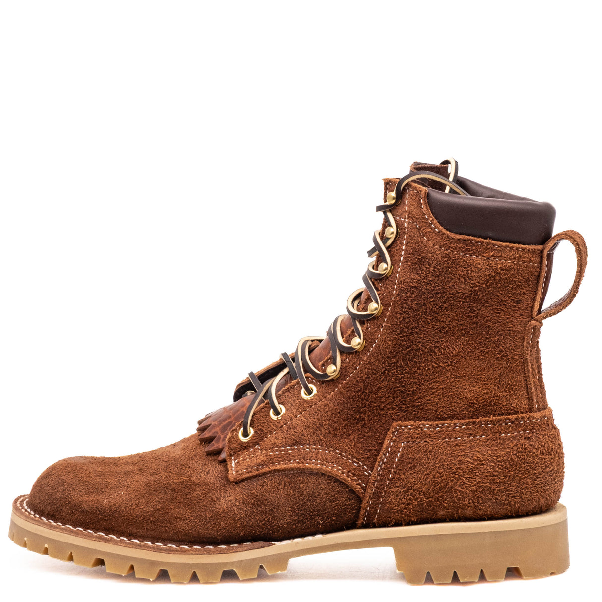 Shrunken bison brown leather Bear Slayer with brown padded collar, honey vibram outsole and 4 relief notches. Left boot standing by itself.