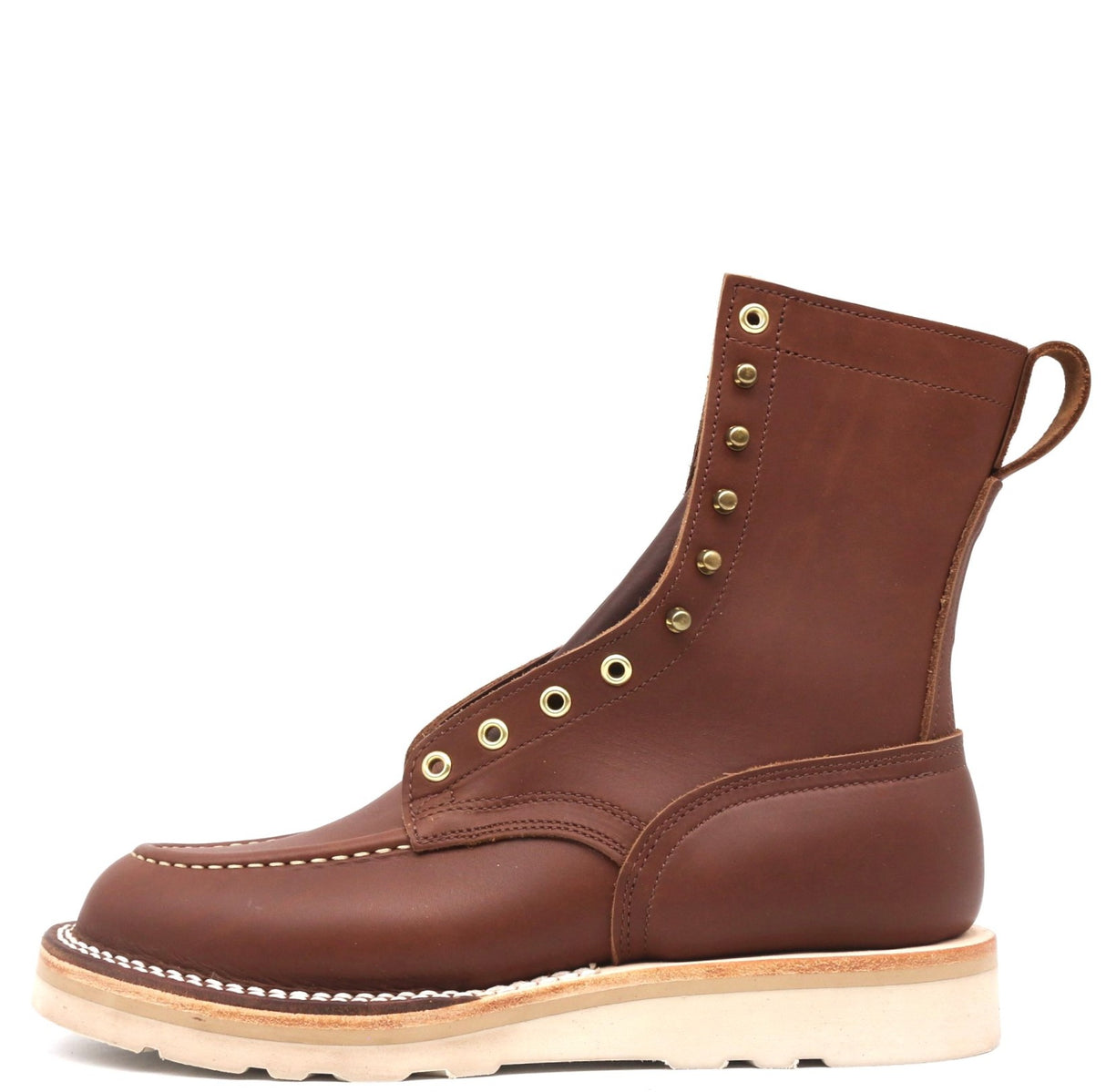 Brown eight inch boot with brass grommets and a white wedge outsole in front of a white background.