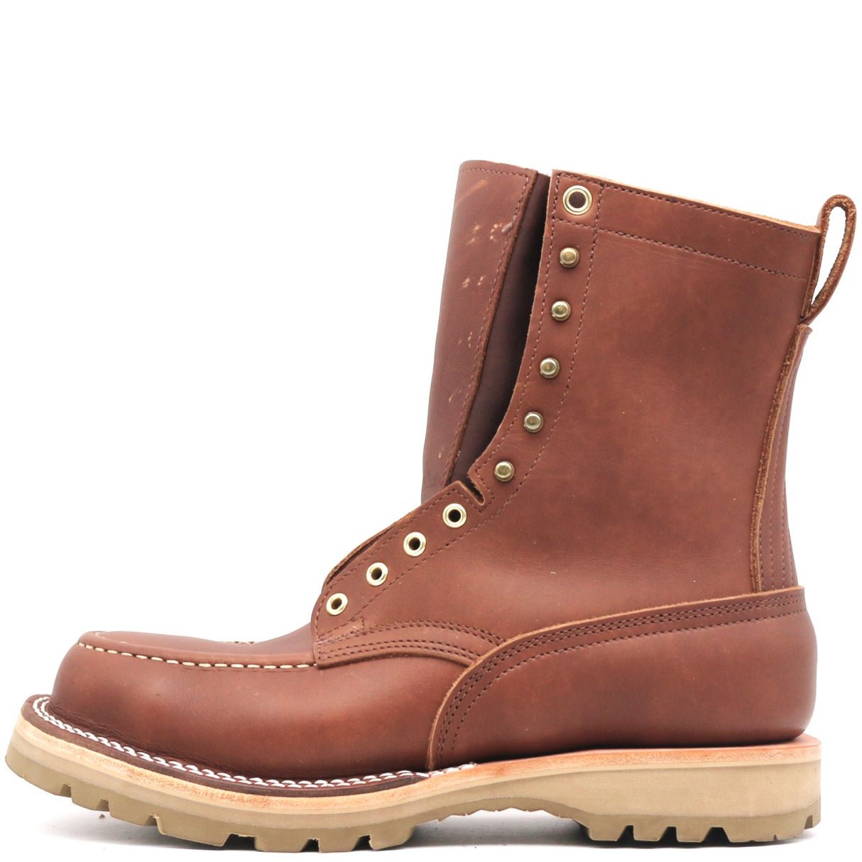 A brown leather lace-up work boot with brass eyelets, a pull tab, and a thick beige lug sole, shown from a side profile on a white background.