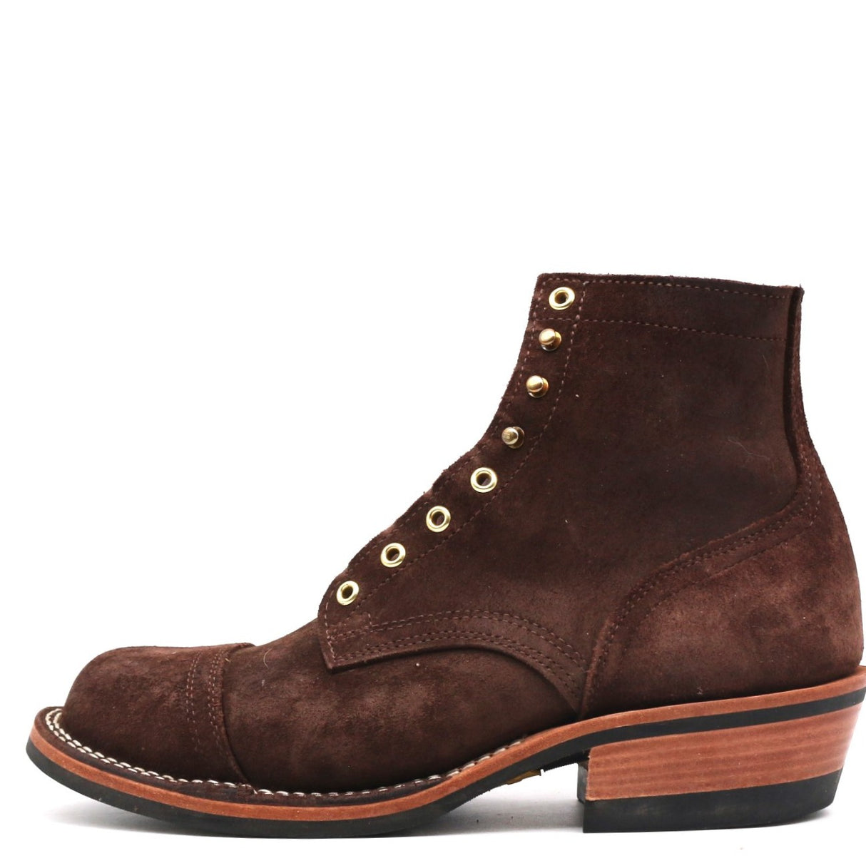 A dark brown suede lace-up ankle boot with gold-tone metal eyelets and a stacked wooden heel, shown from a side profile on a white background.