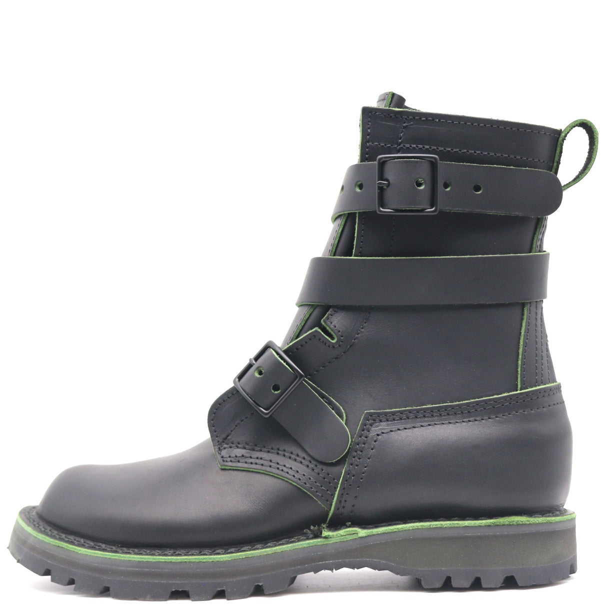 A black leather ankle boot with multiple adjustable straps and bright green contrast stitching, shown from a side profile on a white background.