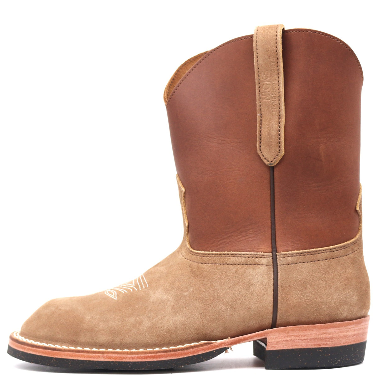 A single brown leather cowboy boot shown in profile against a plain white background. The boot features a tan suede-like lower section with white decorative stitching, a medium brown shaft, and a pull tab on the back.
