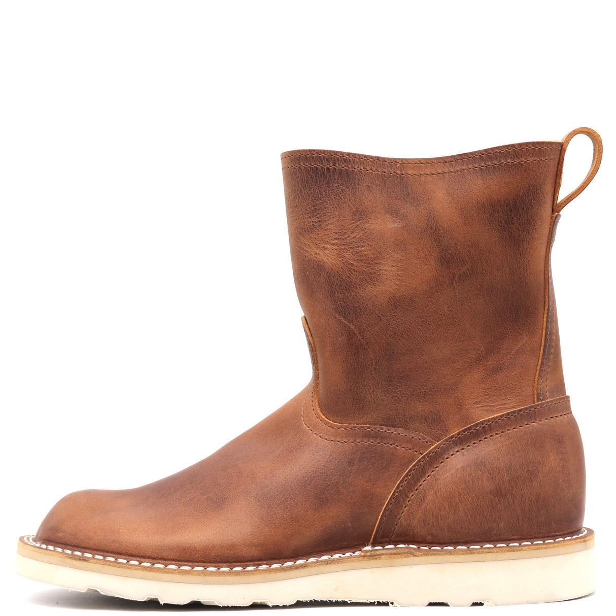 Photo of a brown pull-on boot with a white wedge outsole and a rear pull loop in front of a white background.