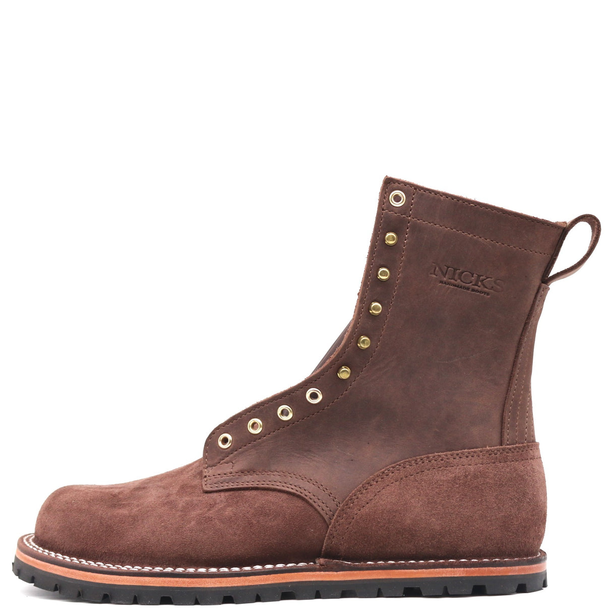 A dark brown suede lace-up ankle boot with brass eyelets, a pull tab, and 'NICKS' embossed on the side, shown against a plain white background.