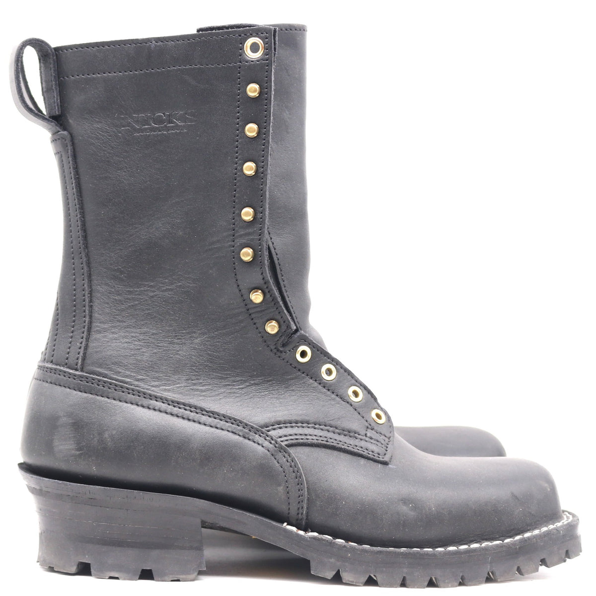 A pair of dark gray leather work boots with gold-tone metal eyelets and studs, shown from a side profile view against a white background.