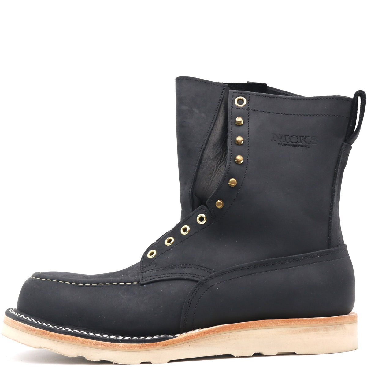 A black leather lace-up work boot with brass eyelets, white contrast stitching, and a light tan sole, shown from a side profile on a white background.