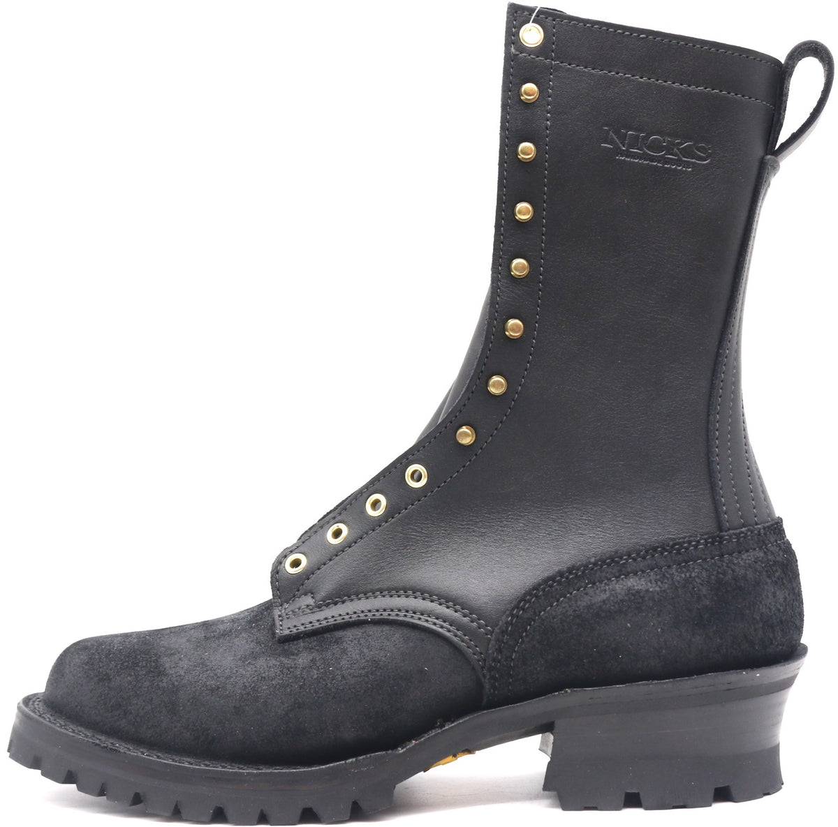 A black leather and suede lace-up boot with brass eyelets and studs, featuring a chunky black heel and a pull tab, shown against a plain white background.