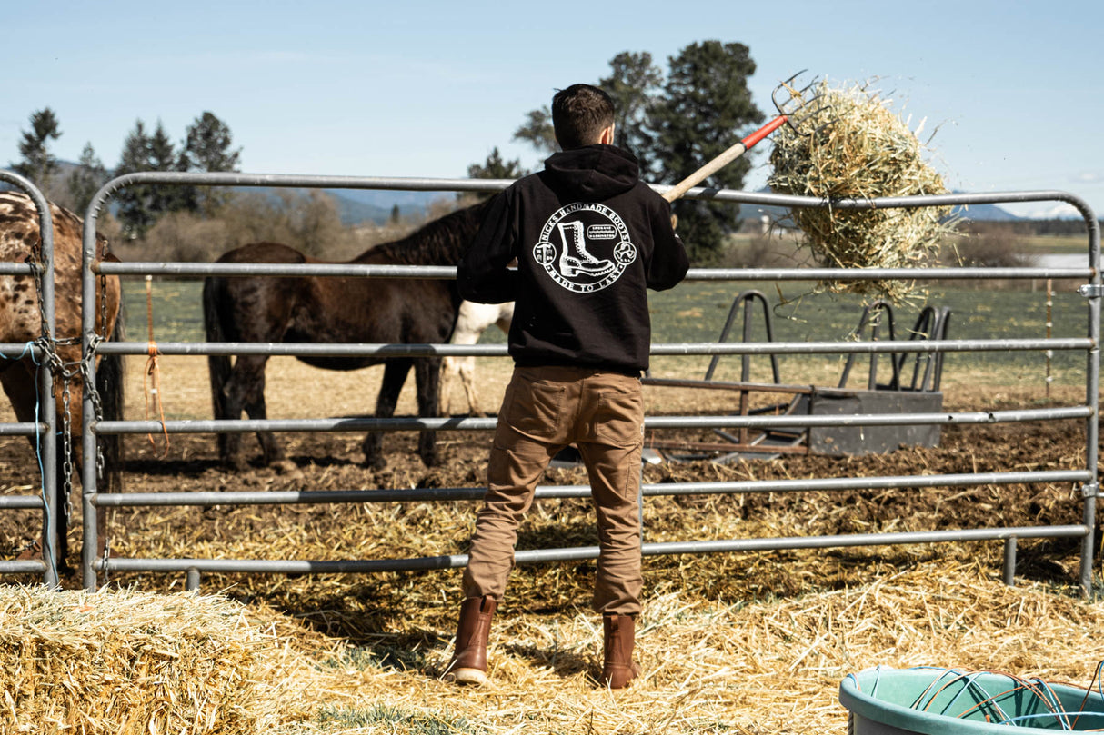 Brown chore boot being worn while doing chores around the farm