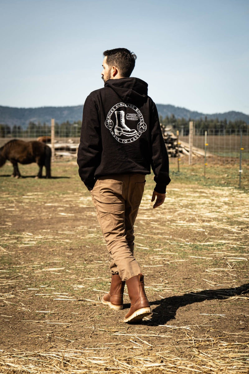 Brown chore boot being worn while doing chores around the farm