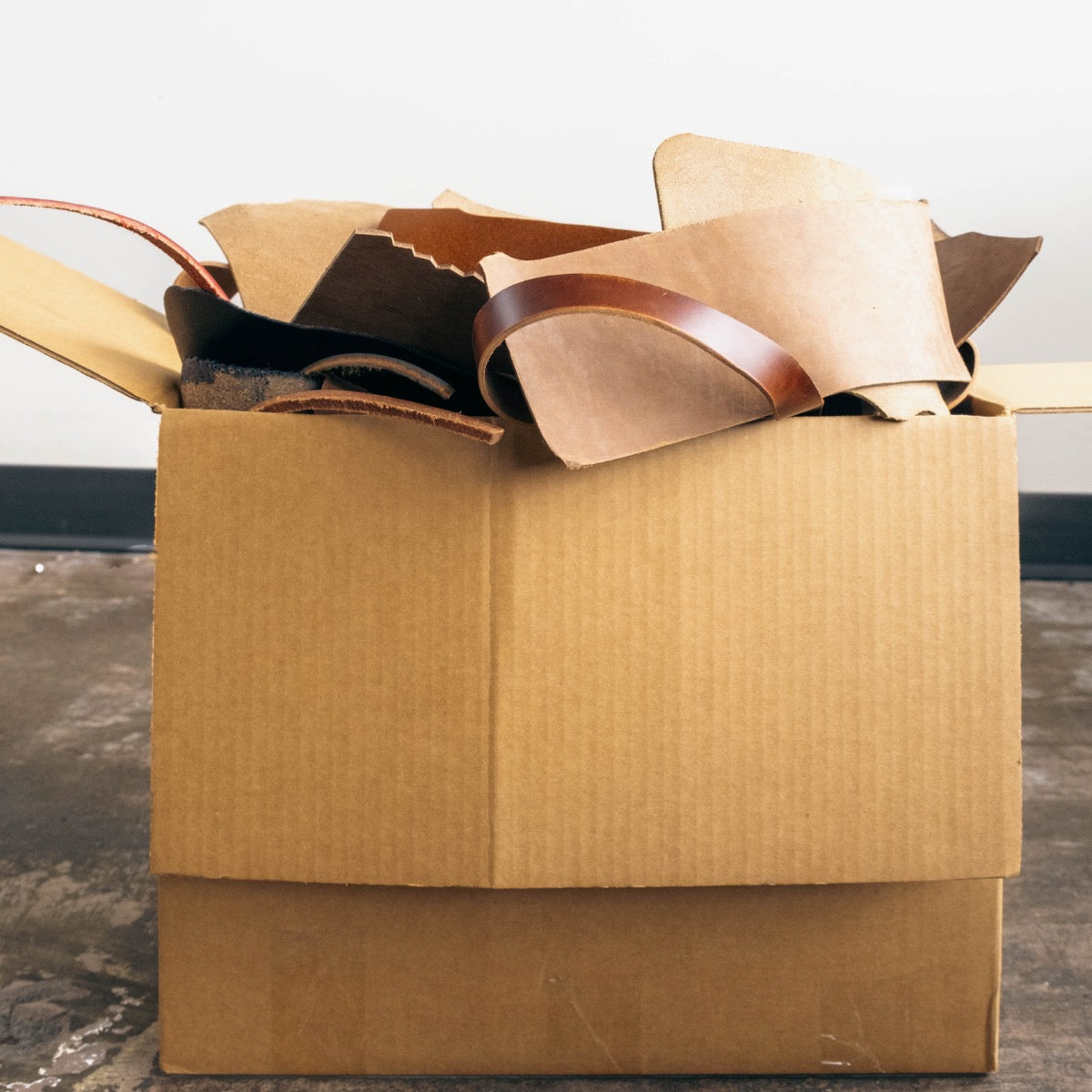 The Scrap Box - Boot and belt leather, straight from the bench.