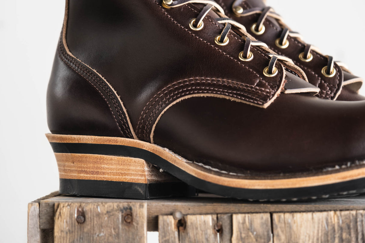 Arbor boot in brown cxl highlighting the logger heel profile