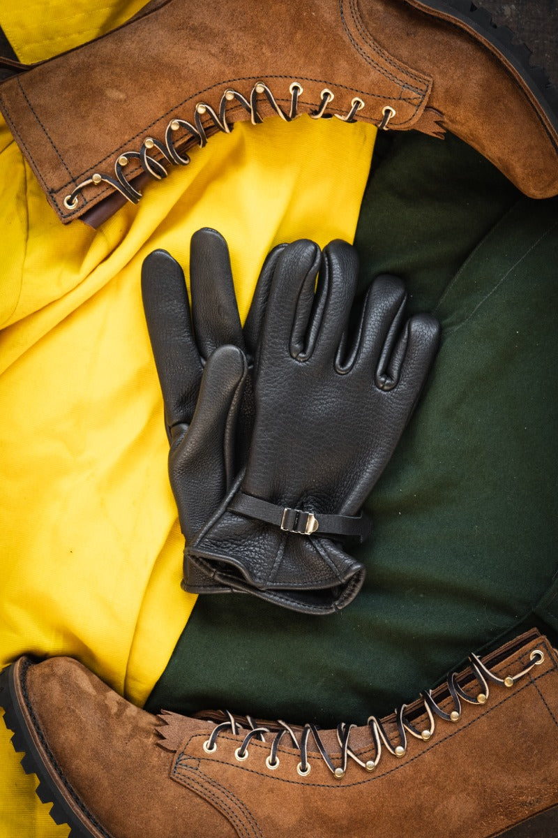 Nicks Fire Gloves in black with wildland gear and fire boots
