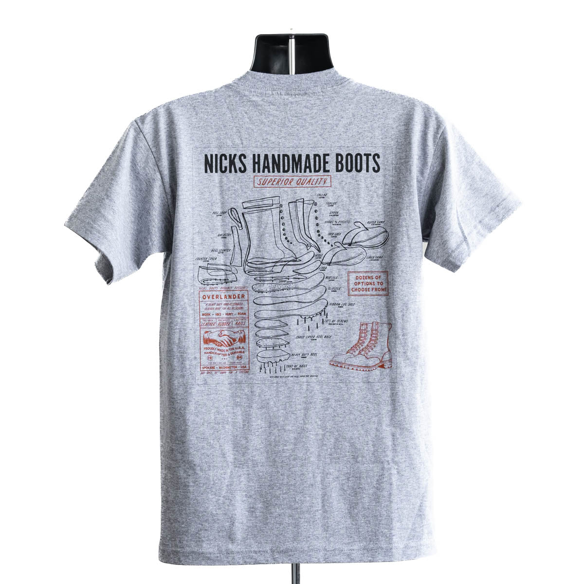 Grey T-shirt with a boot ad on it