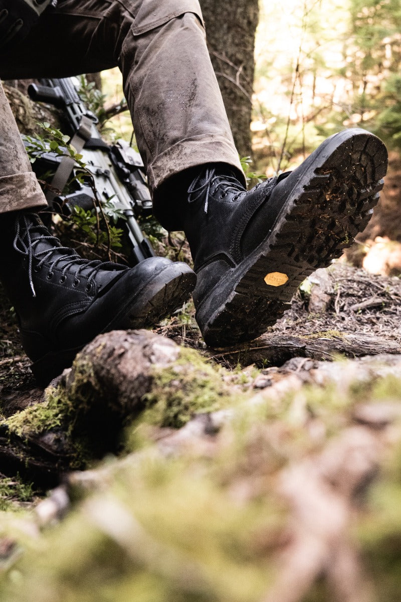 Nicks Tactical Boot Black sierra hiking sole being worn in the woods