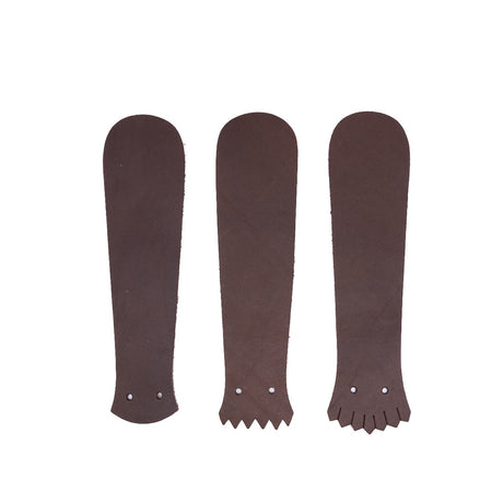 1964 Brown leather Kiltie varieties on a white background. 