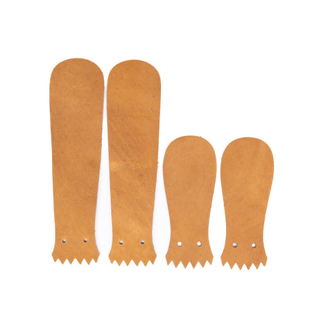 Tan Loggerl leather Kilties on a white background. 