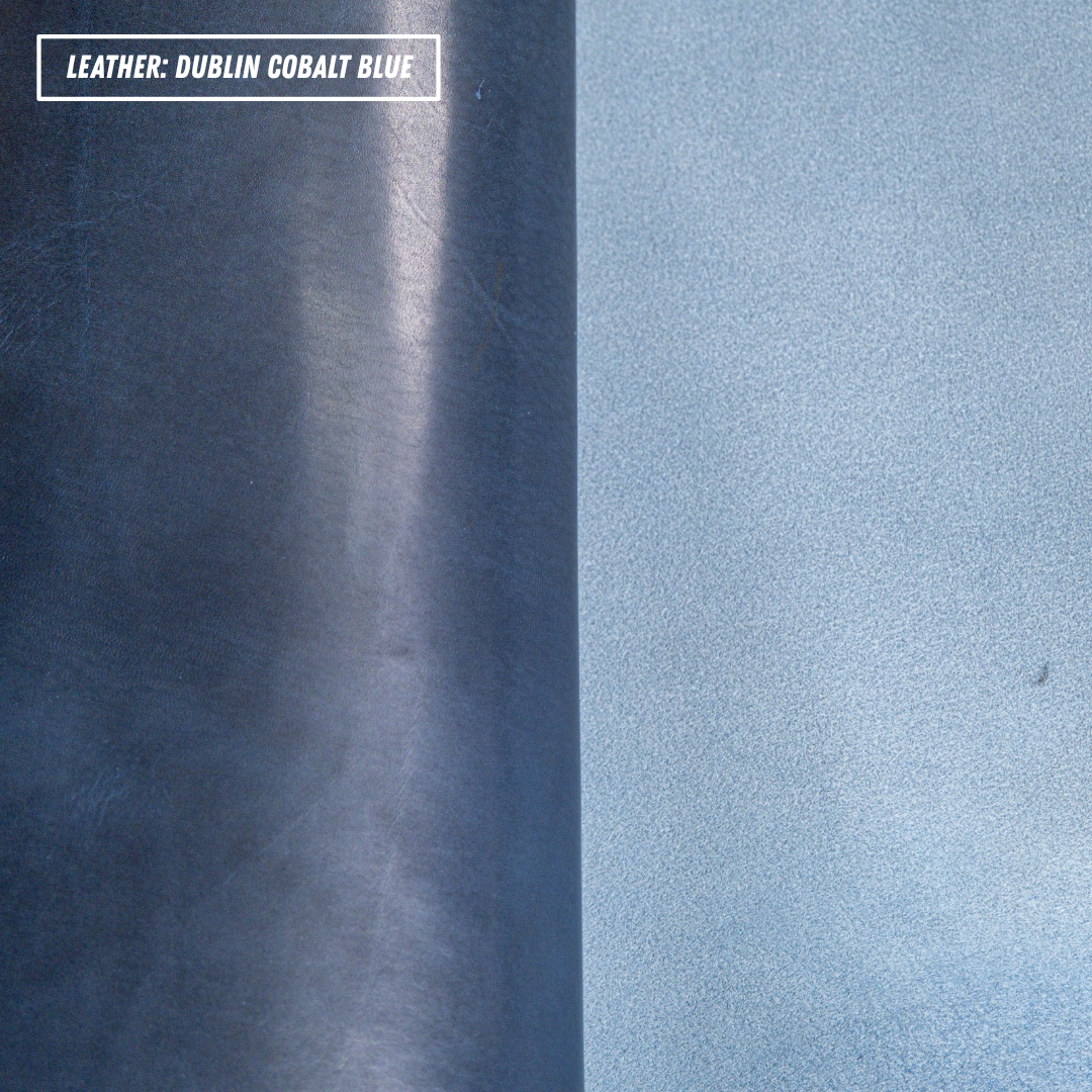 A split-screen texture comparison of leather in 'Dublin Cobalt Blue'. The left side shows a darker, deep blue leather with a subtle vertical sheen, while the right side shows a lighter, brighter blue leather with a fine grain texture.
