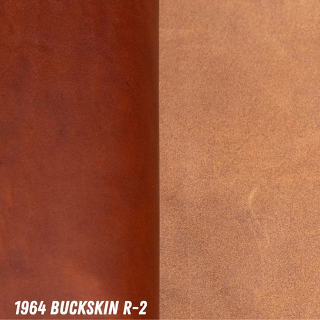 A close-up color and material swatch labeled '1964 BUCKSKIN R-2' showing smooth leather on the left and roughout on the right: a darker reddish-brown on the left and a lighter tan/caramel on the right.