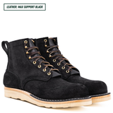 Short black boots sitting together facing forward right. Top left reads "LEATHER: MAX SUPPORT BLACK."