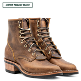 A pair of distressed leather lace-up ankle boots in a brown shade labeled 'LEATHER: PREDATOR ORANGE' in the top-left corner, shown on a clean white background.