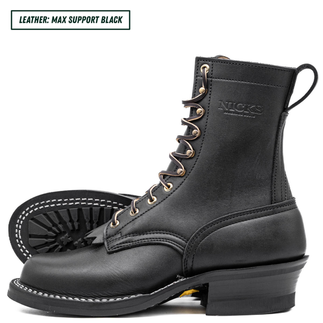 A black leather lace-up boot shown in side profile on a white background, with a second boot placed behind it to show the sole. The brand name 'NICKS' is embossed on the side, and a text label in the top-left corner reads 'LEATHER: MAX SUPPORT BLACK'.