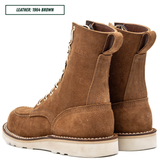 A pair of brown suede lace-up ankle boots shown from the side and back on a white background, with a text label in the top left reading 'LEATHER: 1964 BROWN'.