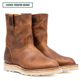 A pair of distressed brown leather mid-calf boots with light tan soles, shown on a white background with a text label in the top left corner that reads 'LEATHER: PREDATOR ORANGE'.