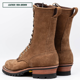 A pair of tall brown suede lace-up boots shown on a white background, with a text label in the top-left corner reading 'LEATHER: 1964 BROWN'.