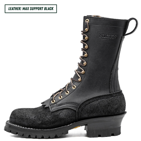 A black leather lace-up work boot with gold-tone eyelets and a thick lug sole, shown in profile on a white background. A text label in the top-left corner reads 'LEATHER: MAX SUPPORT BLACK'.