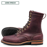 A pair of lace-up ankle boots in distressed plum cypress leather, shown on a white background with one boot standing upright and the other lying on its side to display the sole. A text label in the top left reads 'LEATHER: CYPRESS #8'.
