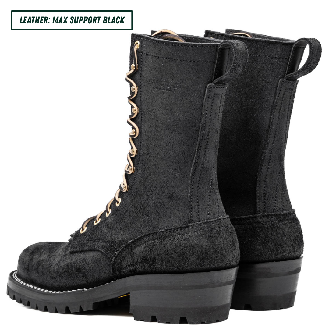 A pair of black leather lace-up boots with gold-tone metal eyelets and pull tabs, shown from a side angle on a white background. A text label in the top-left corner reads 'LEATHER - MAX SUPPORT BLACK'.