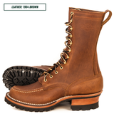 Moc Toe Lug boots, one sitting side profile and the other laying down showing the outsole. Top left reads 'LEATHER: 1964 BROWN.'