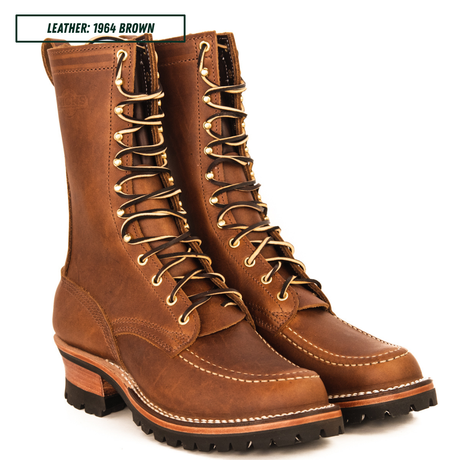 A pair of brown leather lace-up work boots with gold-toned metal eyelets and a chunky lug sole, shown on a white background with a text label in the top left corner.