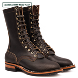 A pair of dark brown waxed leather lace-up boots with brass eyelets and white contrast stitching, shown on a white background with a text label in the top left corner.