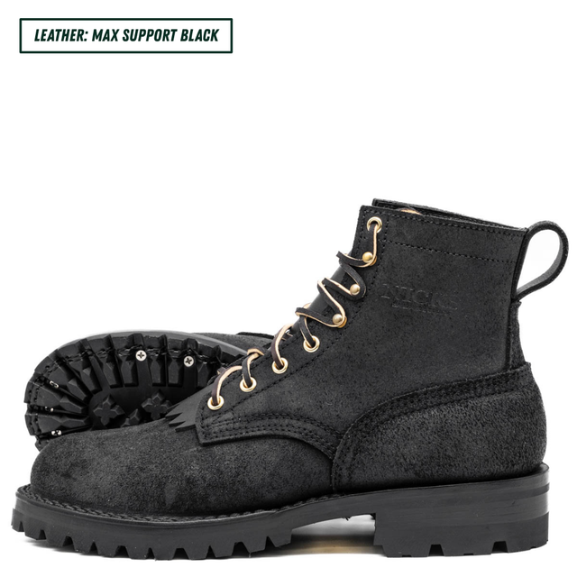 A pair of black leather lace-up boots with gold-toned metal eyelets and a rugged black sole, shown on a white background with a text label in the top-left corner reading 'LEATHER: MAX SUPPORT BLACK'.