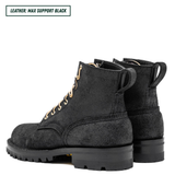A pair of black leather lace-up boots with gold-colored laces and a rugged sole, shown from a side profile view on a white background. A text label in the top-left corner reads 'LEATHER: MAX SUPPORT BLACK'.