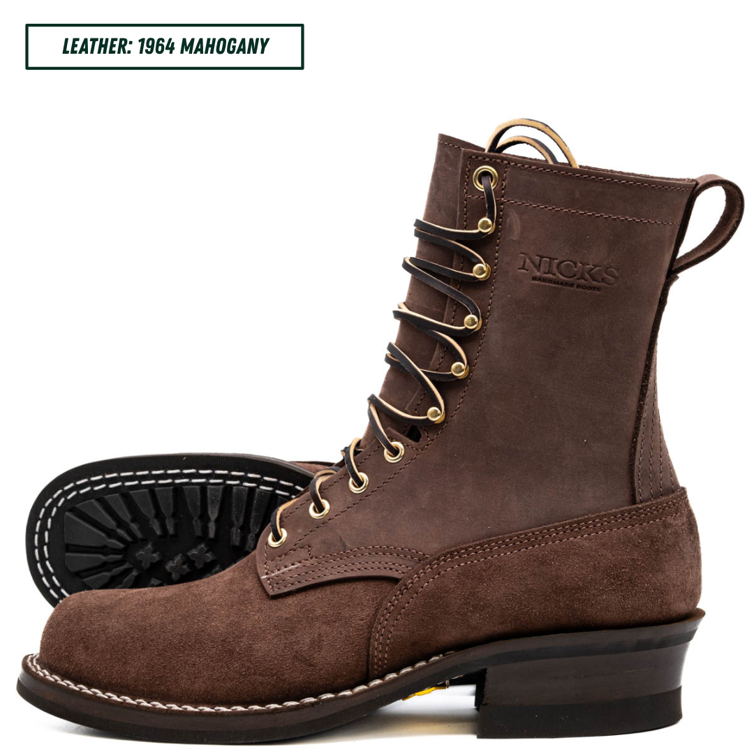 A dark brown suede lace-up boot shown in profile on a white background, with a second boot turned to show the sole behind it. The brand name 'NICKS' is embossed on the side, and a text label in the top left reads 'LEATHER: 1964 MAHOGANY'.